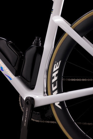 Close-up of a bicycle wheel with Shimano components on a black background