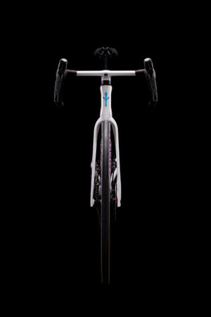 White bicycle on a black background