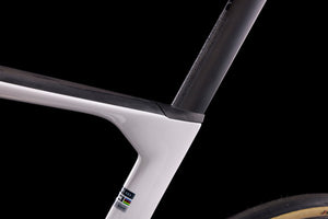 Close-up of a bicycle frame with a black background